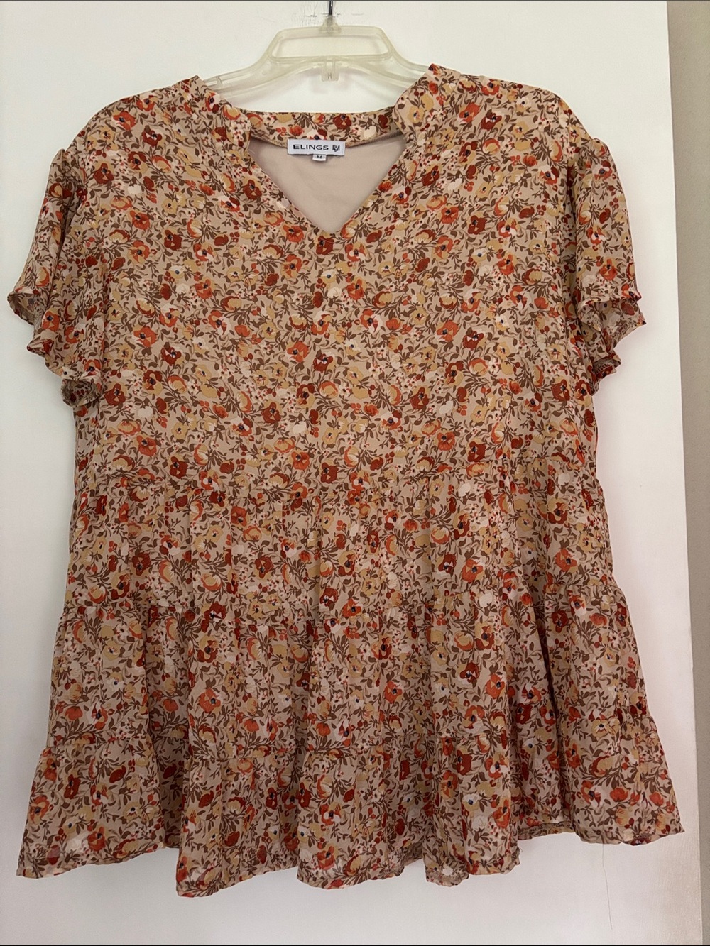 Elings Floral V-Neck Peplum Blouse in Beige and Orange
